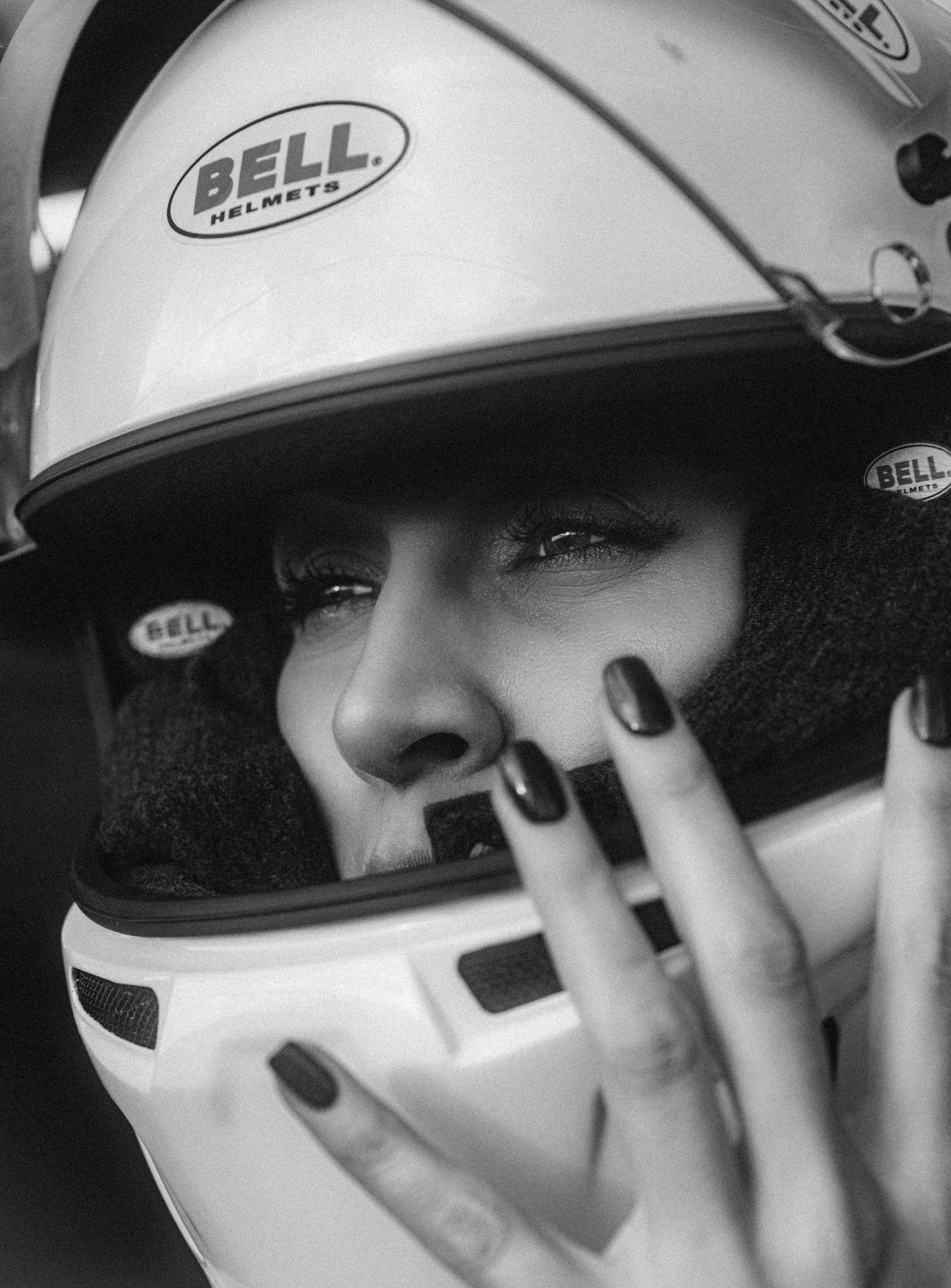 Carmen wearing a racing helmet