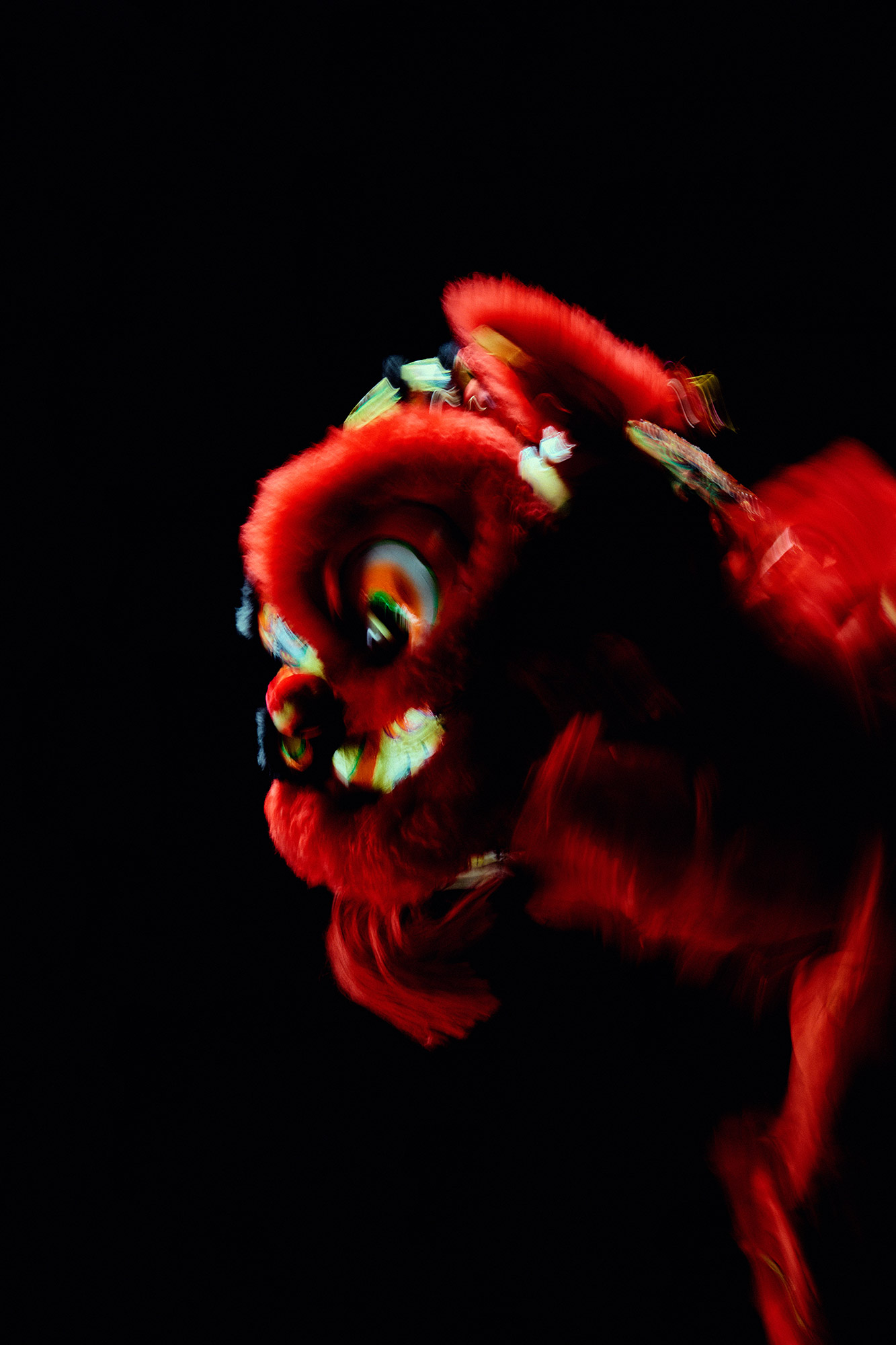A close up image of a LION item in red